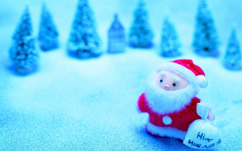 Santa Claus figurine in snow