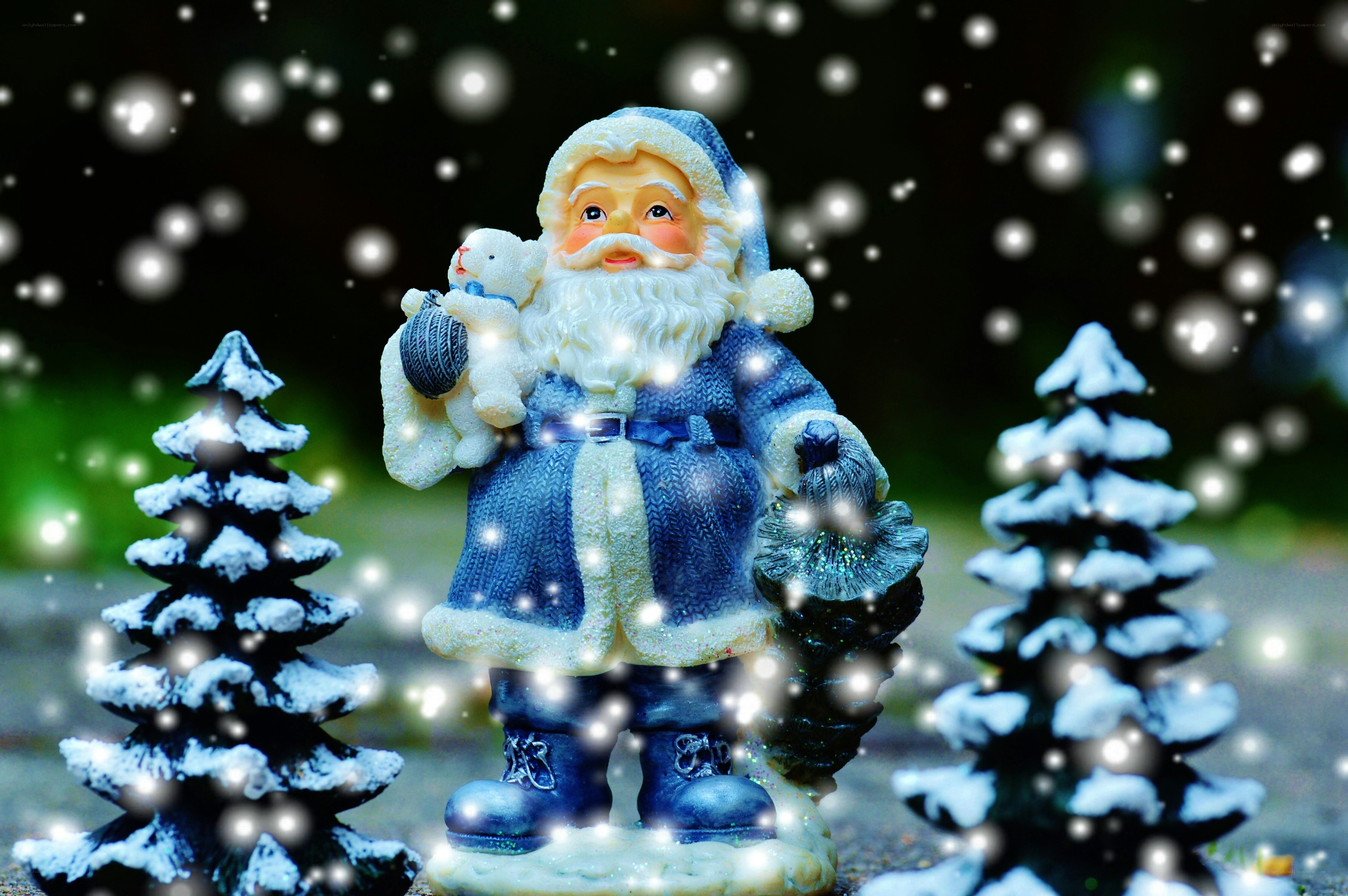 Santa Claus figurine in snow