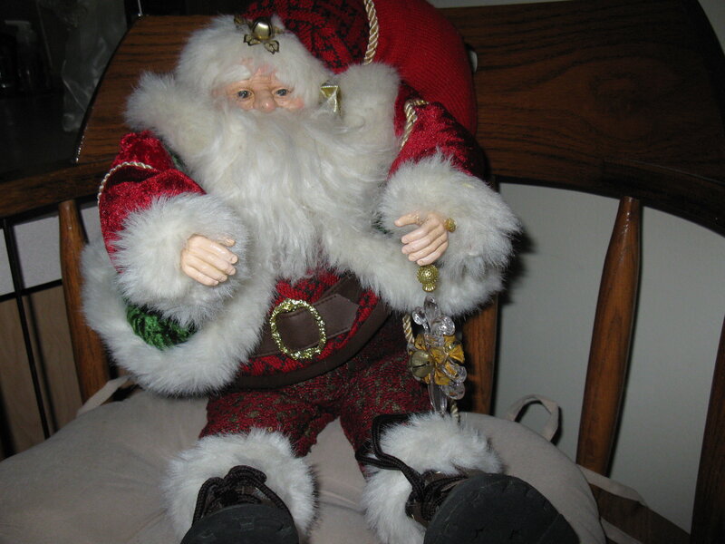 Santa Claus figurine on chair