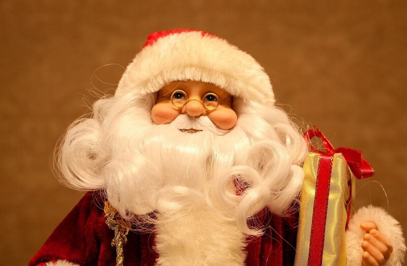 Santa Claus figurine with gift