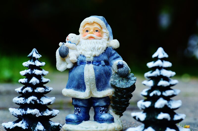Santa Claus figurine with trees