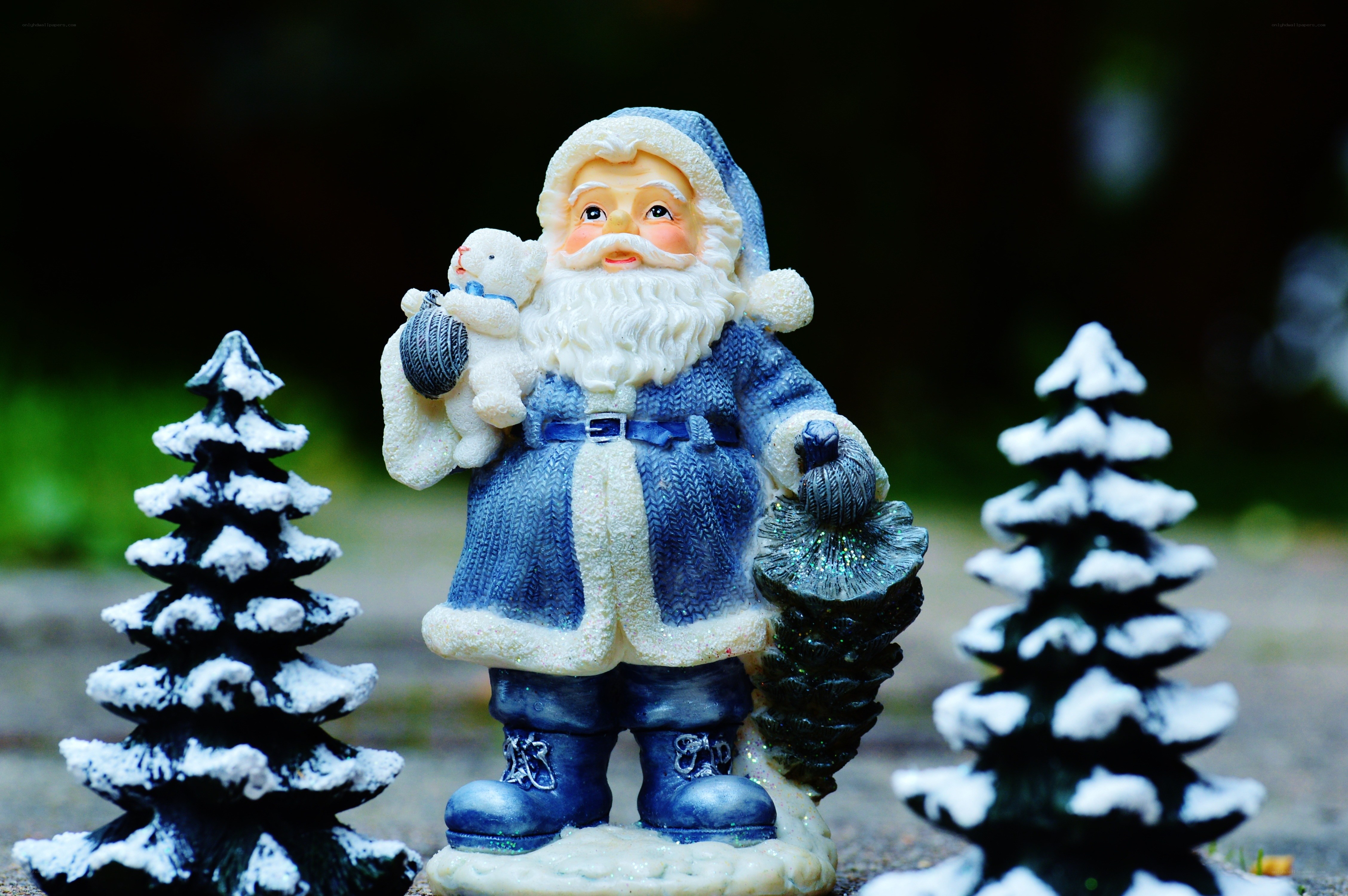 Santa Claus figurine with trees