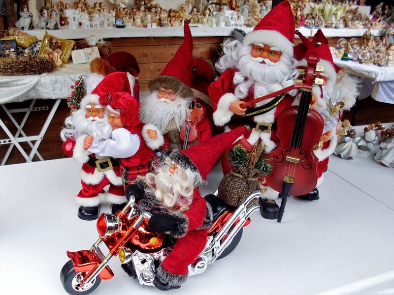 Santa Claus figurines on display