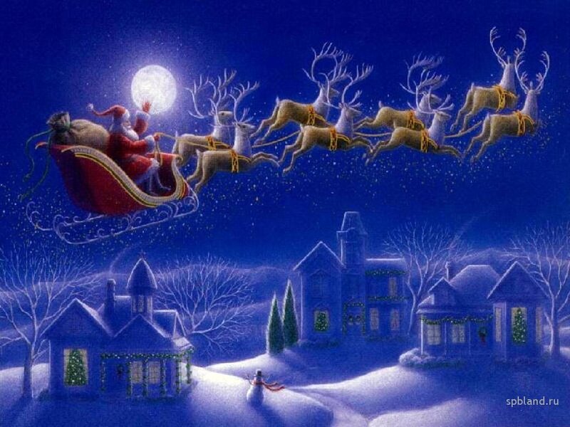 Santa Claus flying over a snowy village