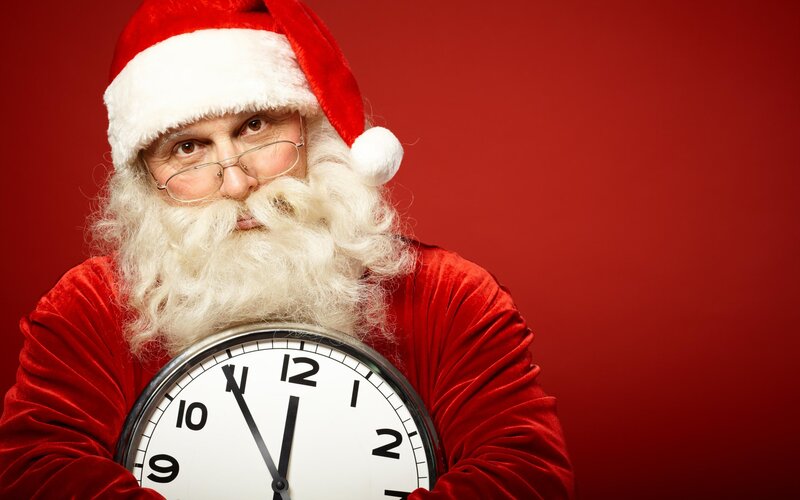 Santa Claus Holding Clock