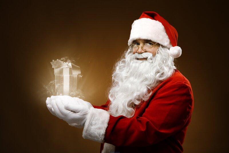 Santa Claus Holding Gift — Red, Festive, Photograph