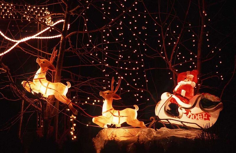 Santa Claus in a sleigh at night