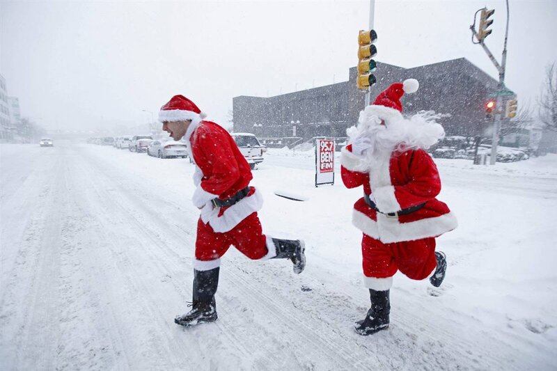 Santa Claus running in snow