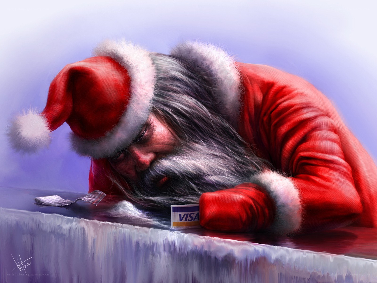 Santa Claus sleeping on desk