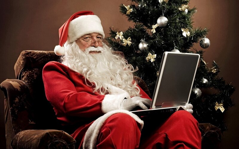 Santa Claus Using Laptop — Red, Festive, Winter, Photograph