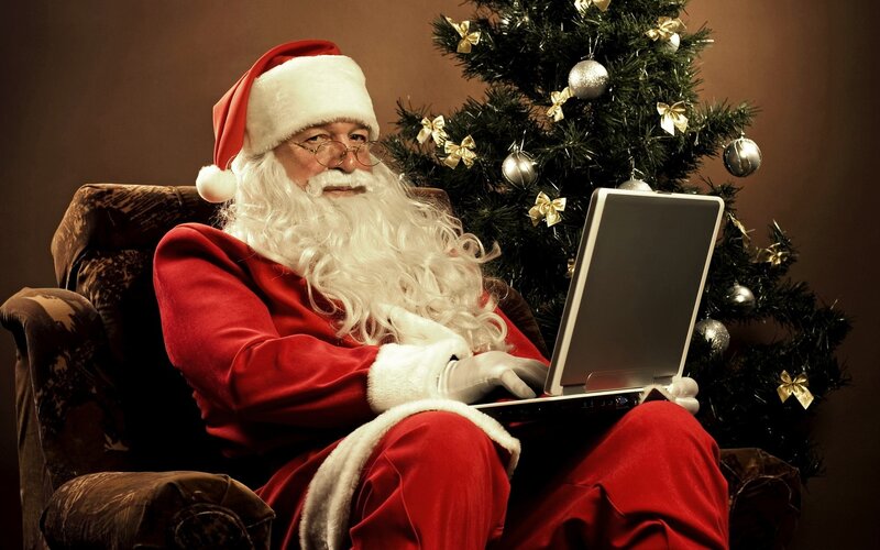 Santa Claus Using Laptop
