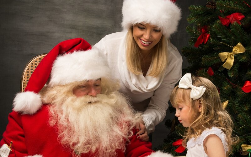 Santa Claus with Woman and Girl