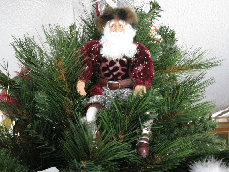 Santa doll on Christmas tree
