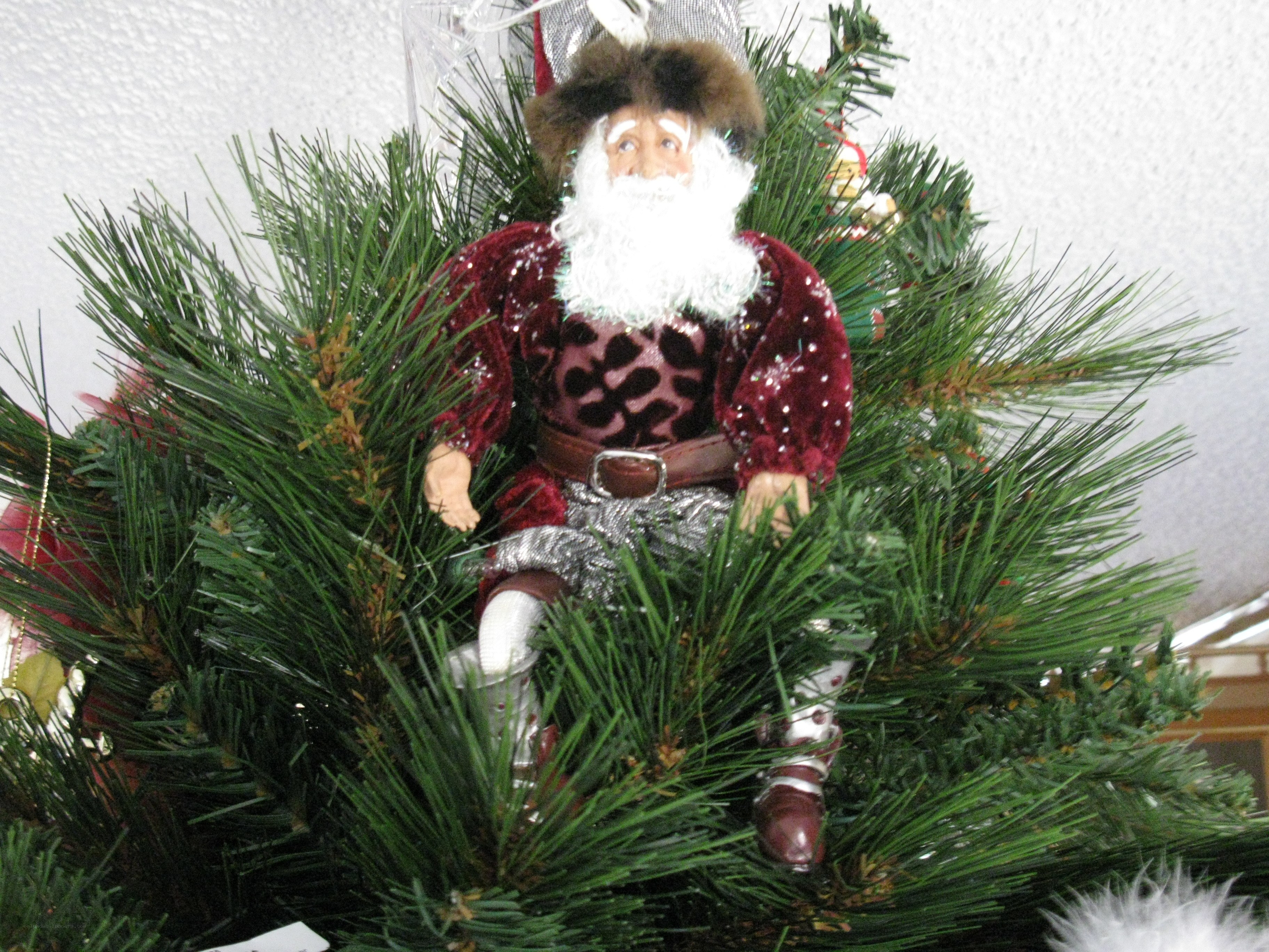 Santa doll on Christmas tree