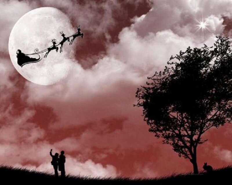 Santa flying over a couple