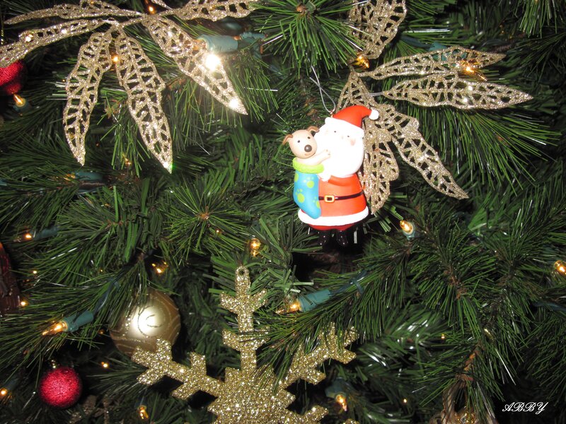 Santa Holding Dog Ornament