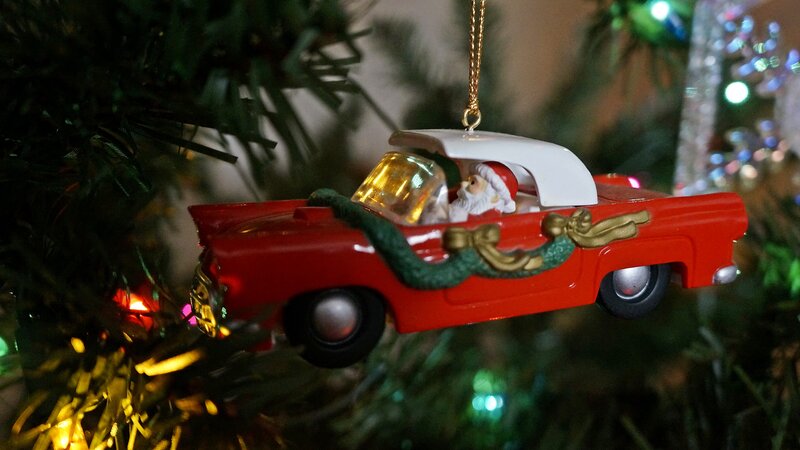 Santa in Red Car Ornament