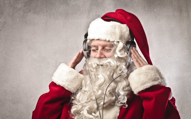 Santa listening to music