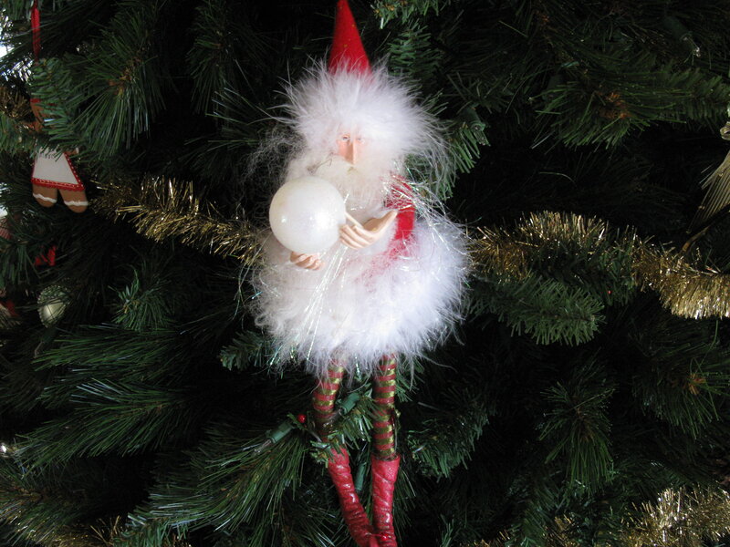 Santa ornament on tree