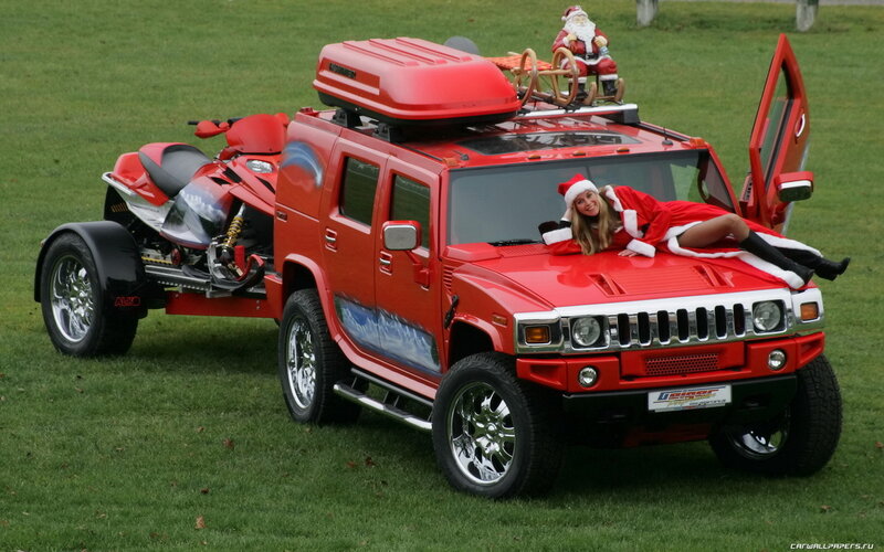Santa-themed Hummer with woman