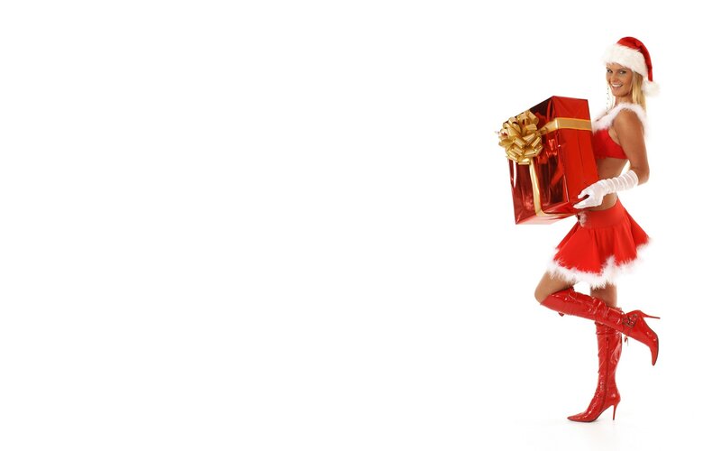 Santa-themed woman with gift