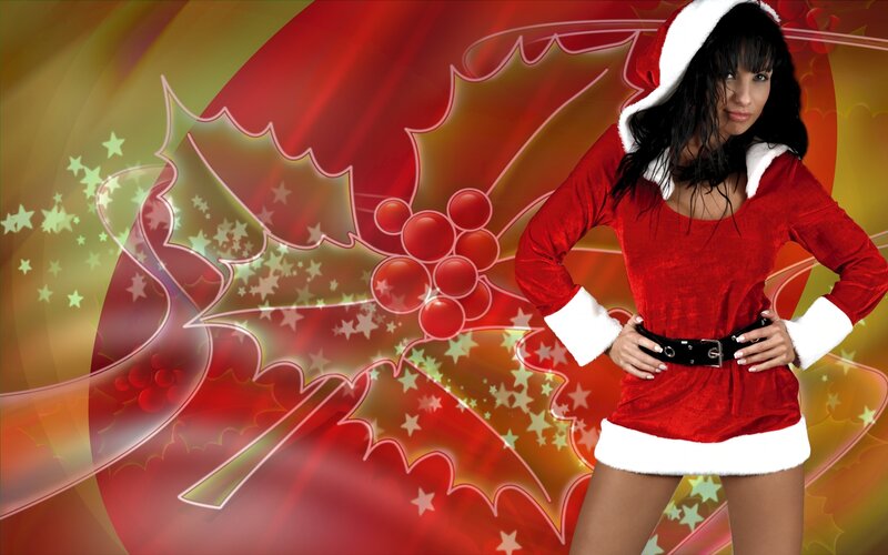 Santa-themed woman with holly