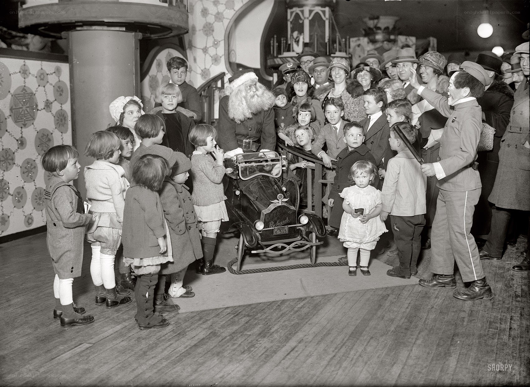 Santa with children and car