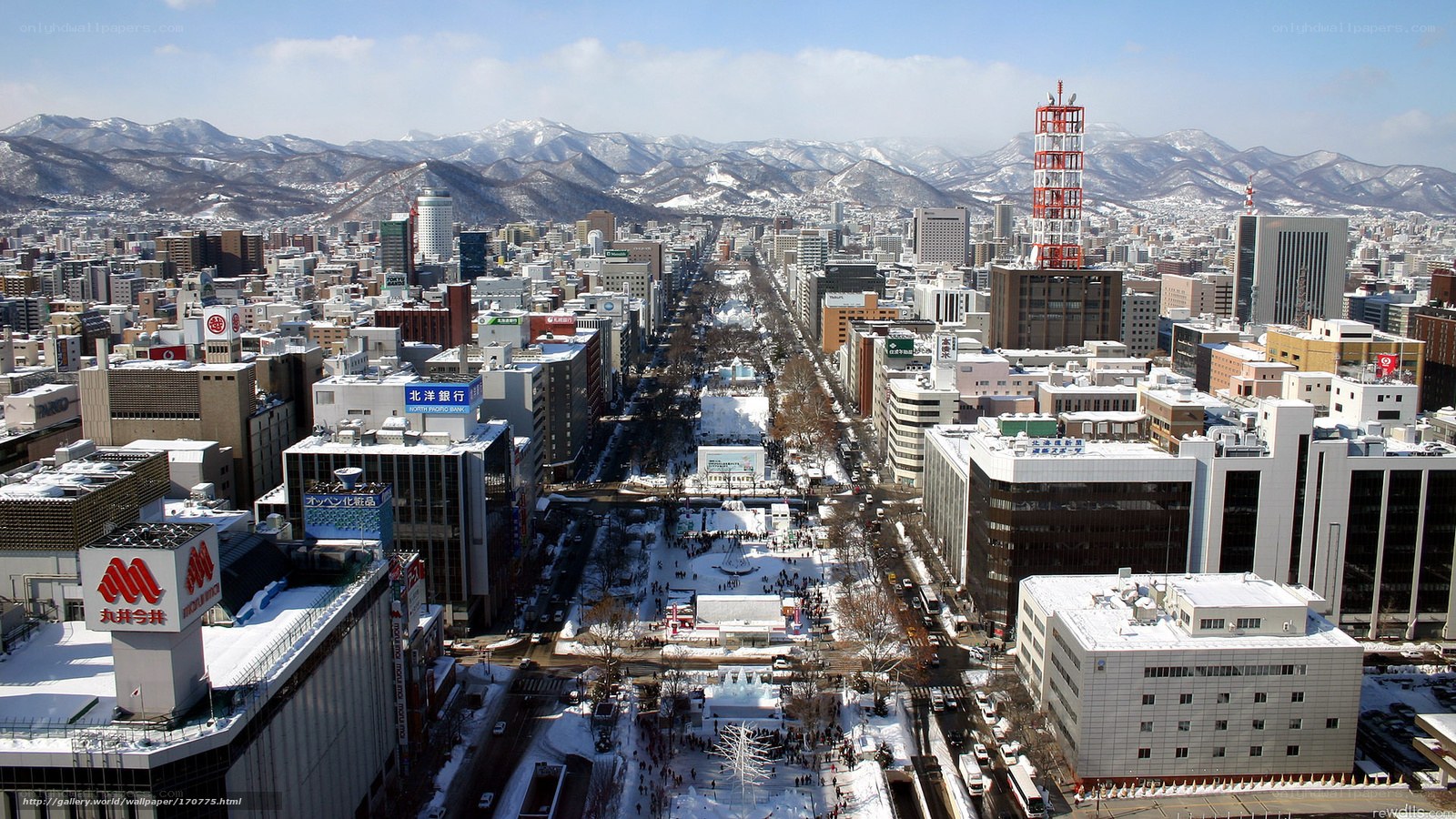 Sapporo cityscape with snow-covered mountains