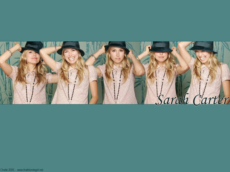 Sarah Carter in a hat