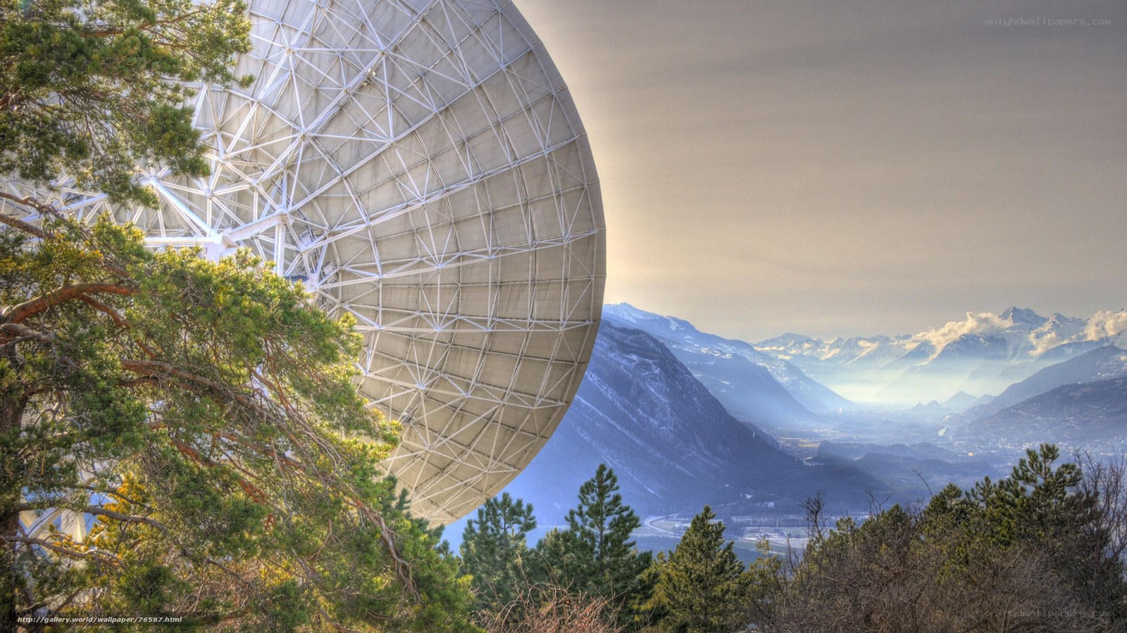 Satellite dish in mountain landscape