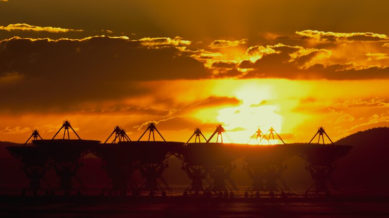 Satellite Dishes at Sunset — Orange, Dramatic
