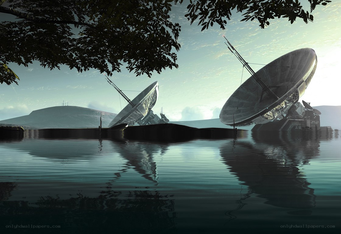 Satellite dishes by the water