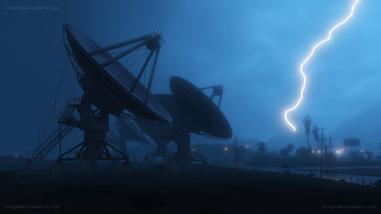 Satellite dishes during a storm