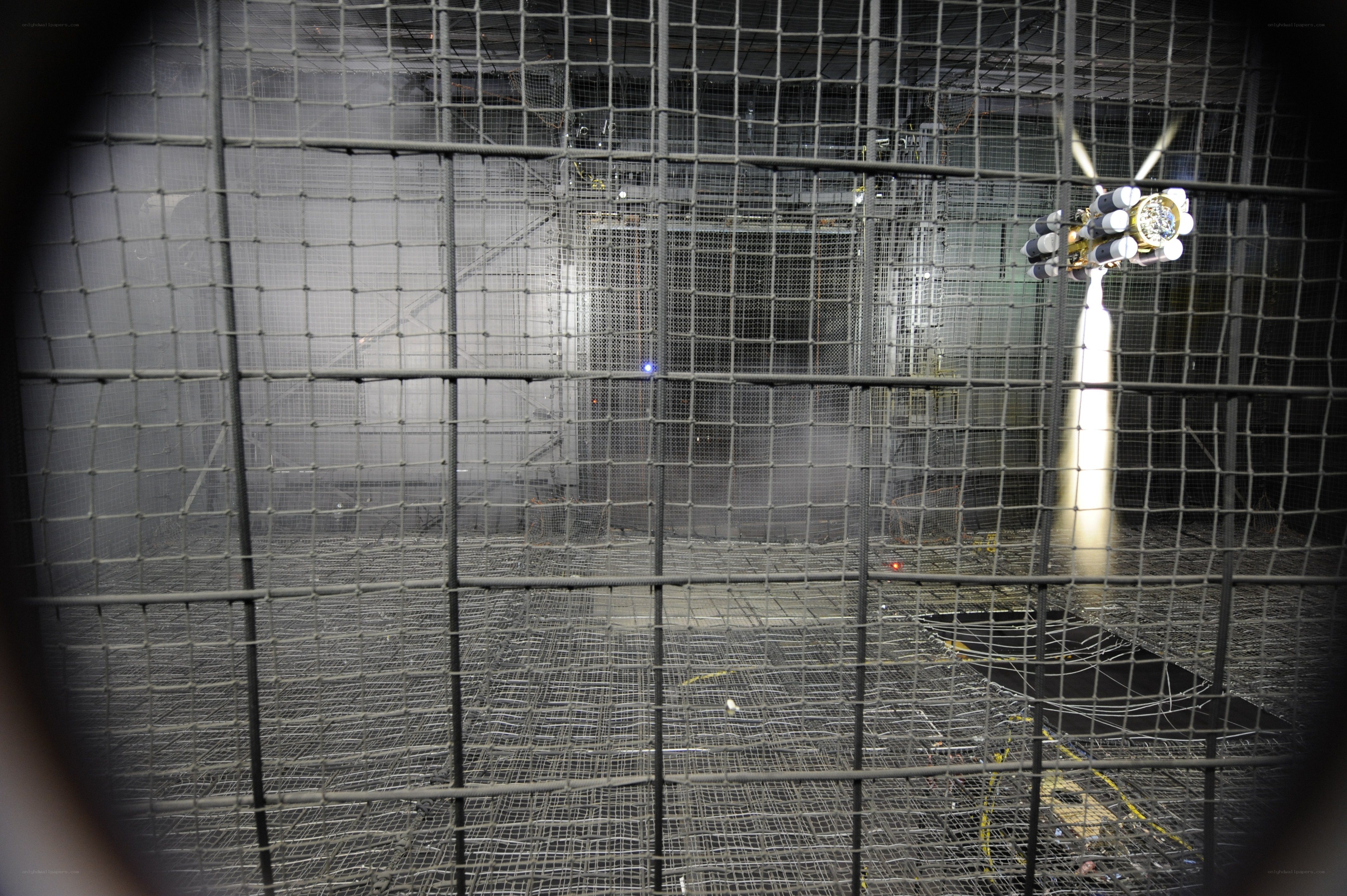 Satellite engine test in a cage