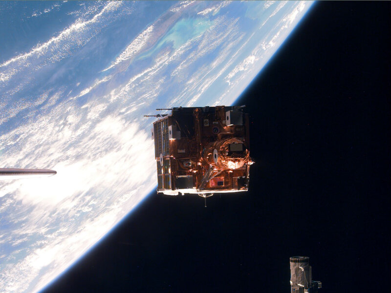 Satellite in Orbit — Blue, Dramatic, Photograph
