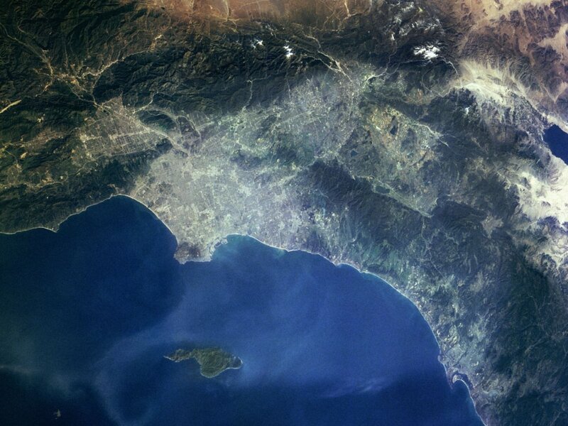 Satellite view of coastal city