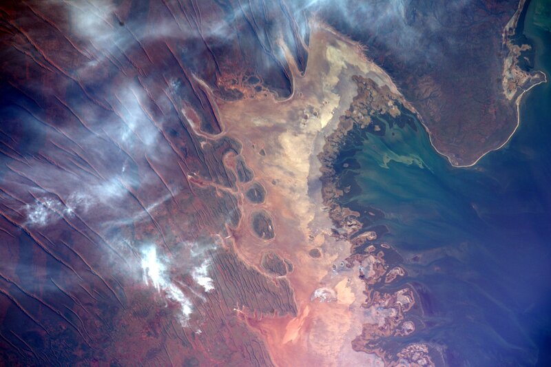 Satellite View of Coastline — Brown