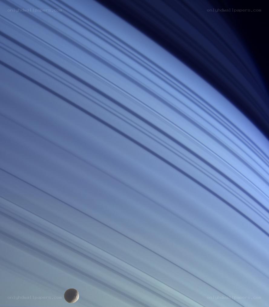 Saturn and its rings with moon