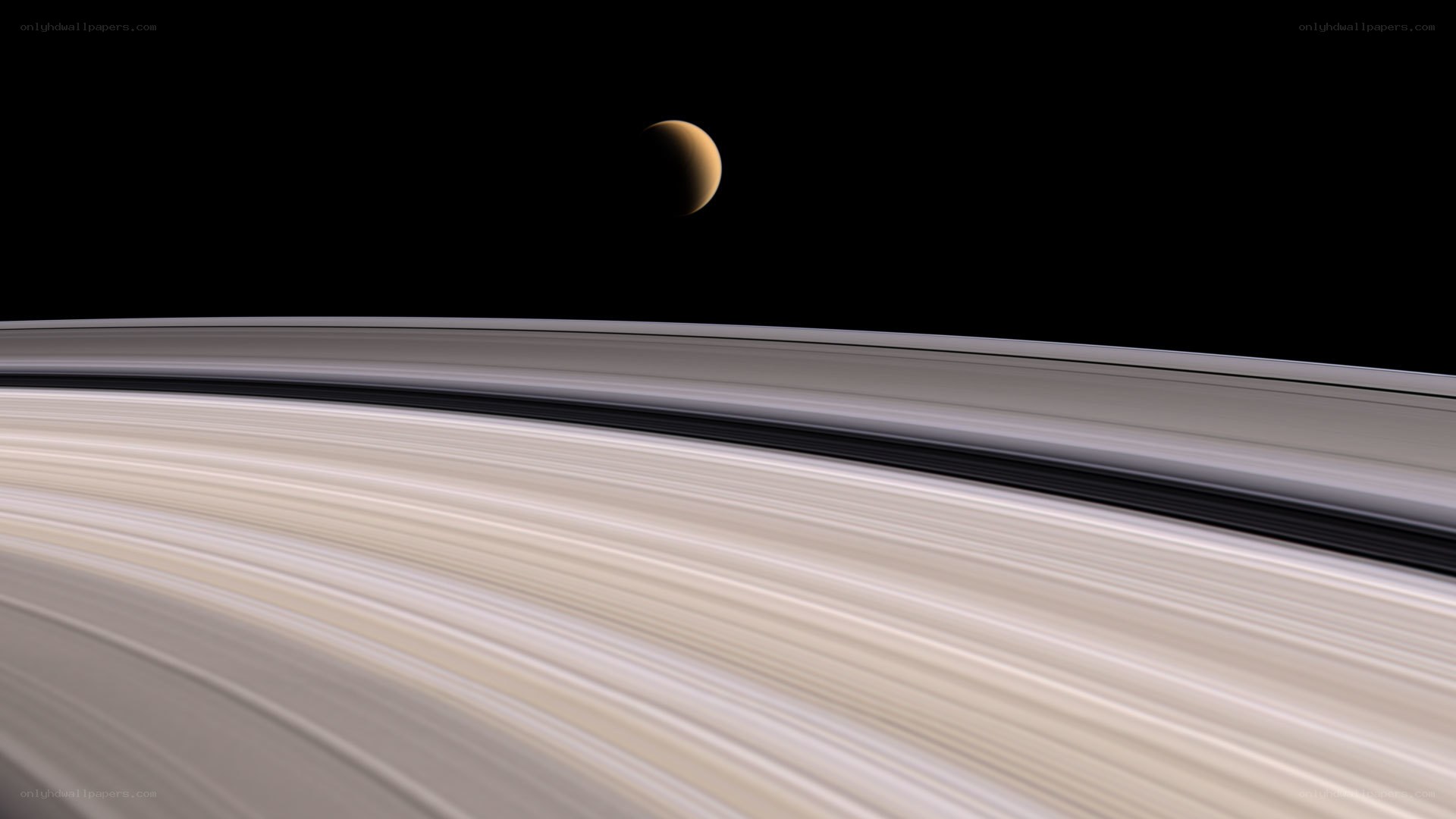 Saturn and its rings with moon