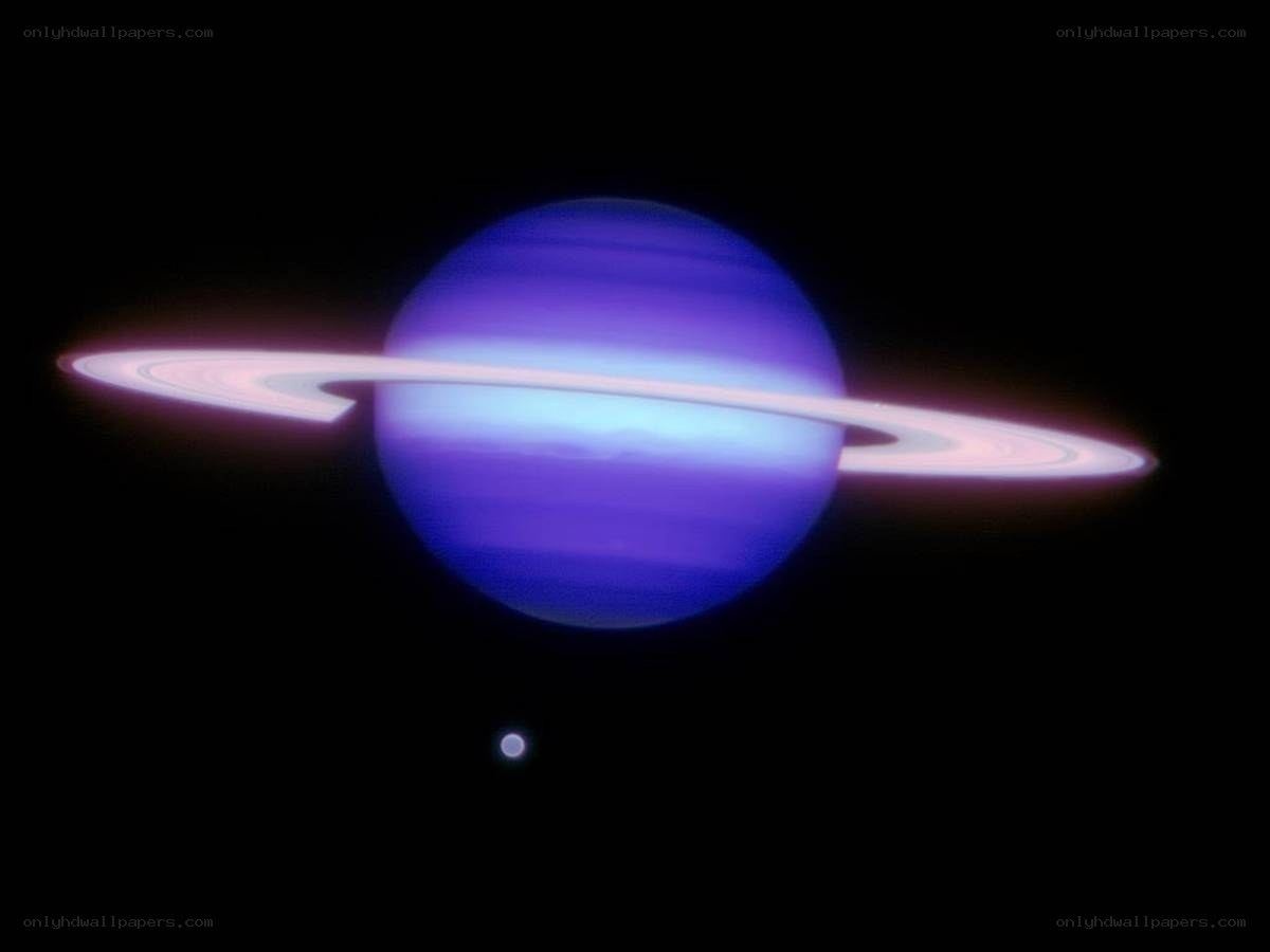 Saturn with rings and moon