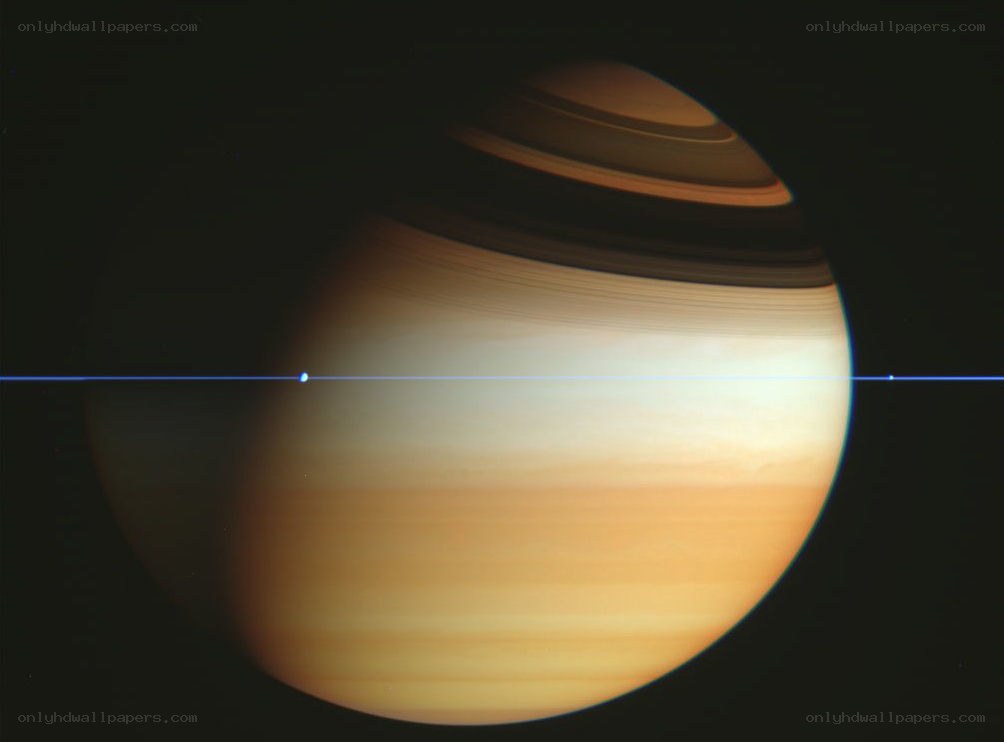 Saturn with rings and moon