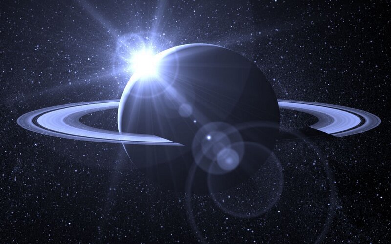 Saturn with rings in space