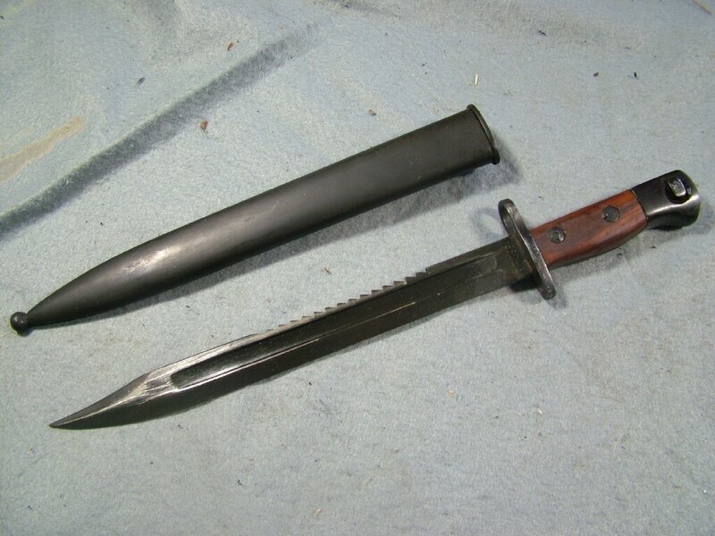 saw-toothed bayonet with scabbard