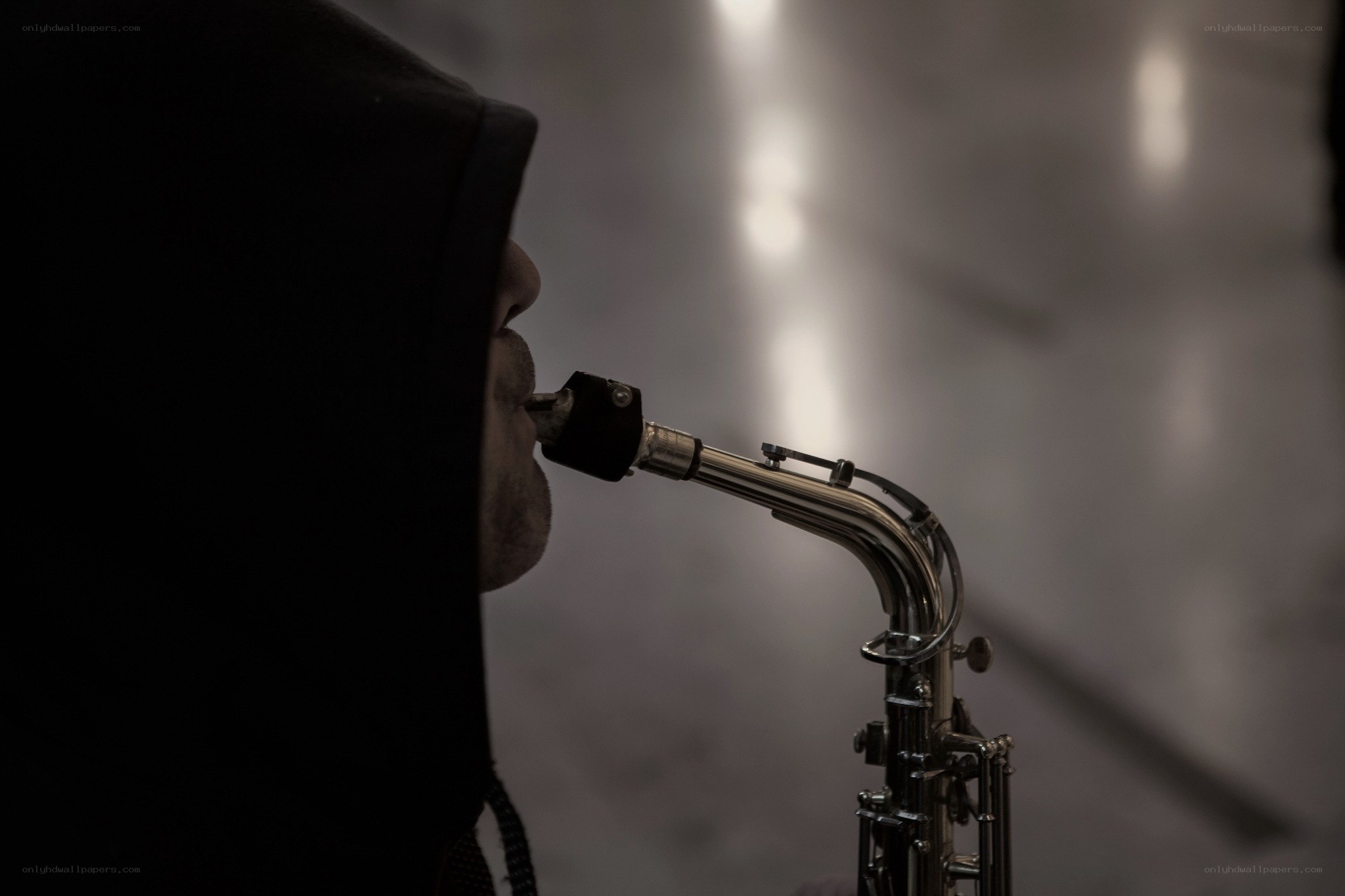 saxophone player in silhouette