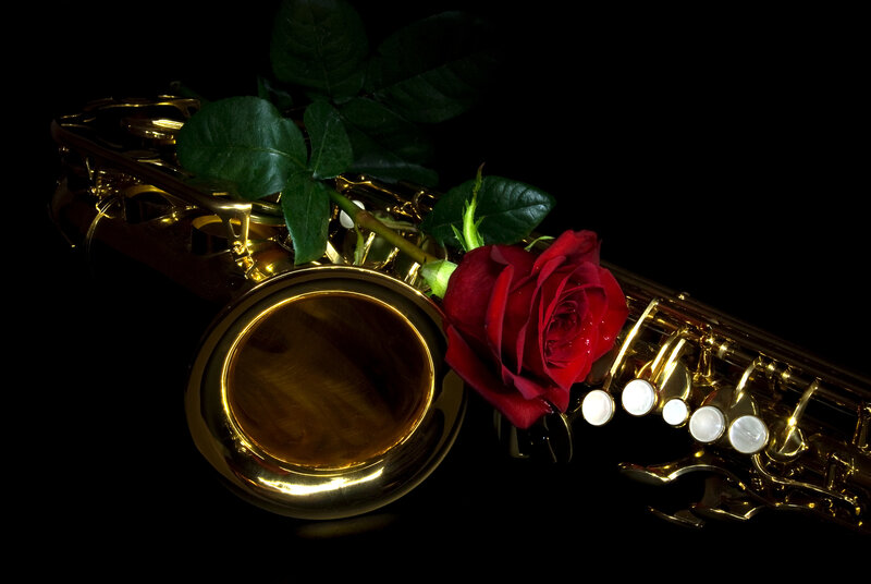 Saxophone with red rose