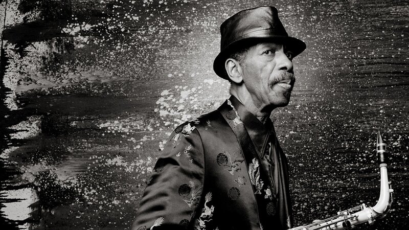Saxophonist in a patterned jacket