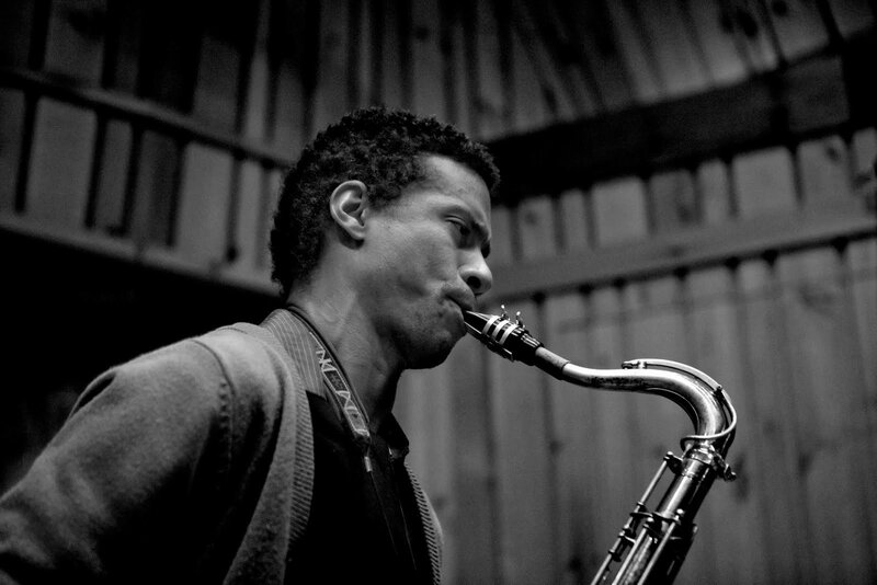 Saxophonist performing in black and white