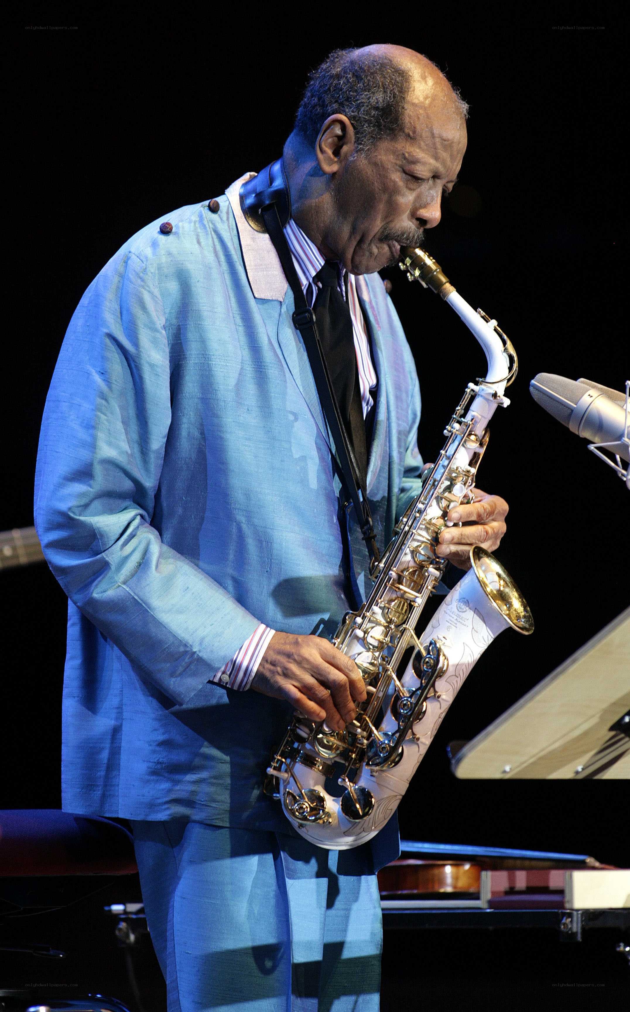 Saxophonist performing on stage