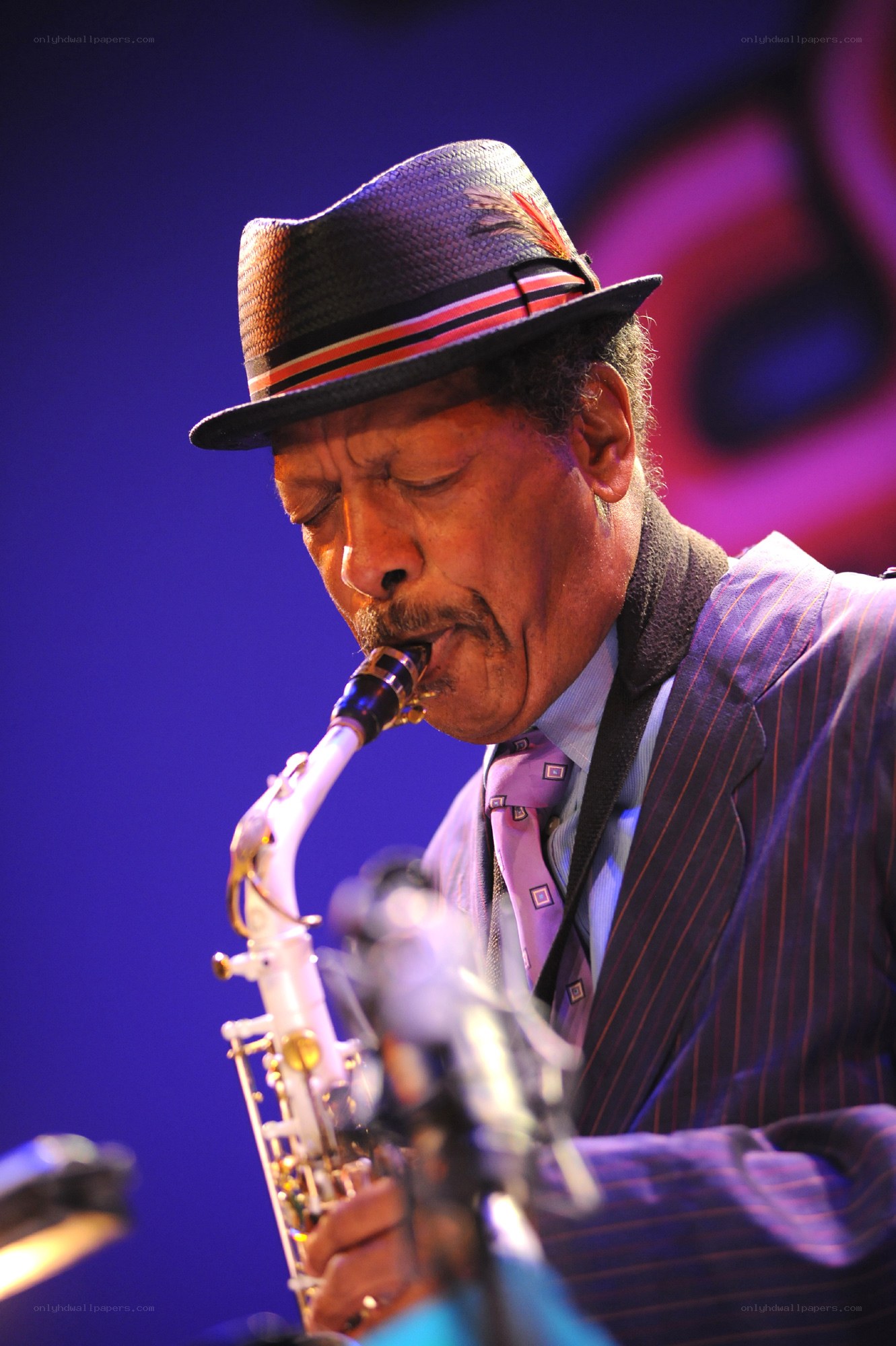 Saxophonist performing on stage