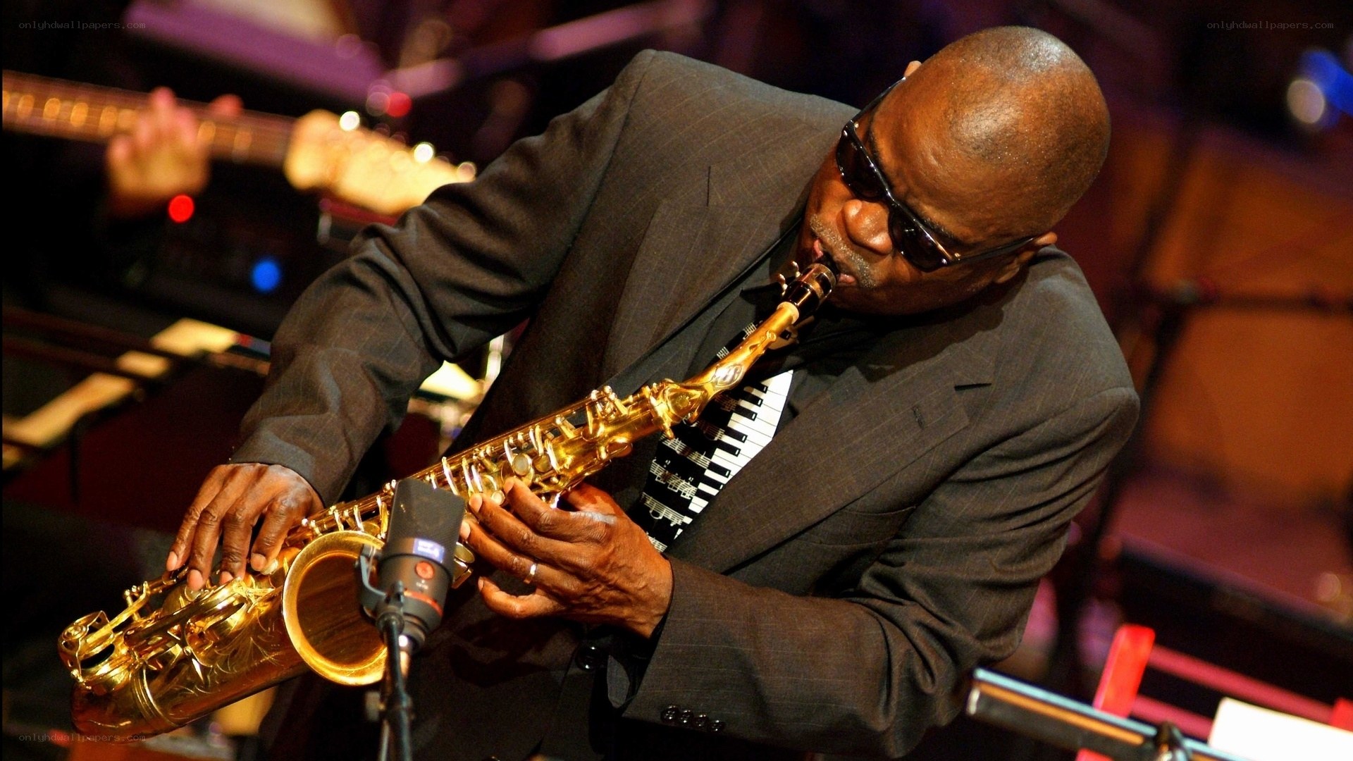 Saxophonist performing on stage